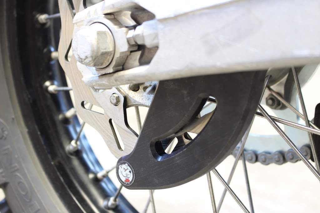 Protezione disco freno posteriore AXP RACING KTM 250 EXC 2012-2023
